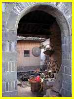 Courtyard entrance in Hakka walled earthen village, Tufang, Changting