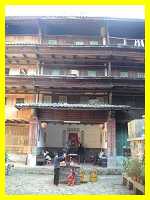 inside a grand old 4 storey square earthen building in Yongding