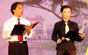 Robin on stage at a gala  on the Zhangzhou campus